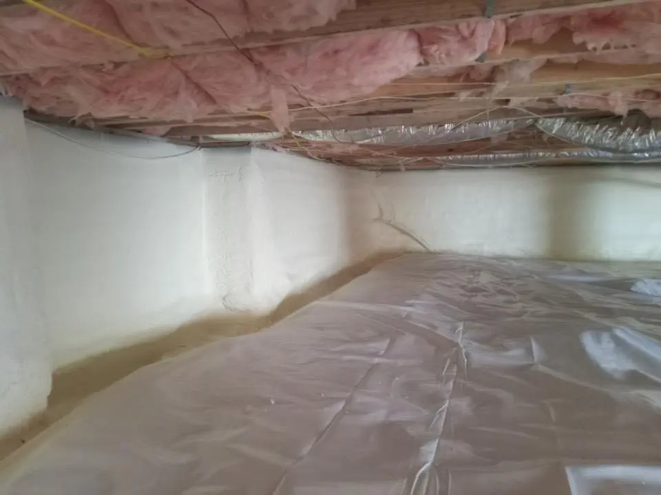 Crawl space encapsulation with closed-cell spray foam for Storm Damage Roof Repair in Greenfield